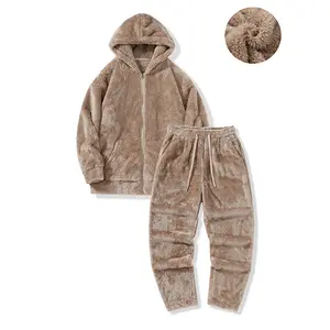 Men’s winter Arctic fleece set—thickened for warmth and cold protection; sweatshirt and long pants, loose casual fit, complete coordinated outfit for outdoor wear.