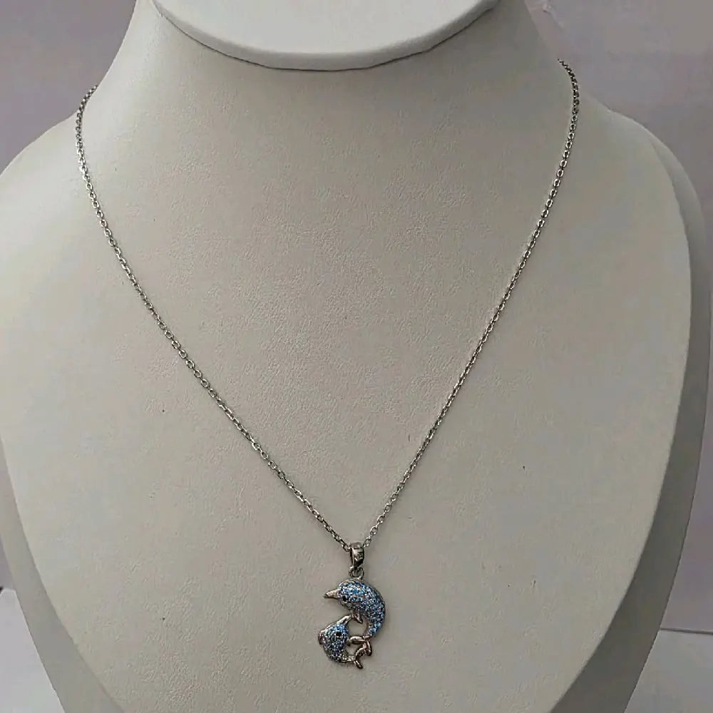 Elegant Dolphin Pendant Necklace with Sparkling Blue Accents on Silver Chain for Women