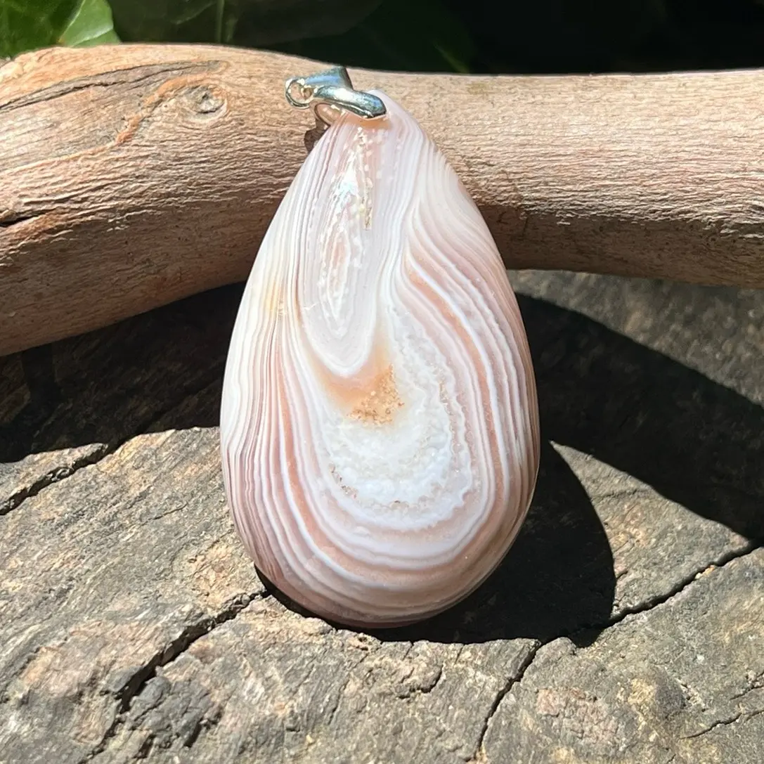 Sterling silver pink Botswana agate pendant