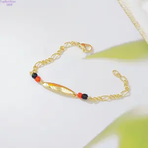 Women’s Niche Geometric Smooth Gold‑Tone Long Bracelet, Retro Red‑Black Contrast Round Bead Design, Light Luxury Versatile Fashion Jewelry for Daily Commute, Dating, Casual Outings, Evening Parties & Holiday Gift‑Giving