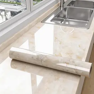 Self-adhesive marble pattern wall sticker shows natural layered texture for kitchens, bathrooms and rental spaces, creating a clean modern style.