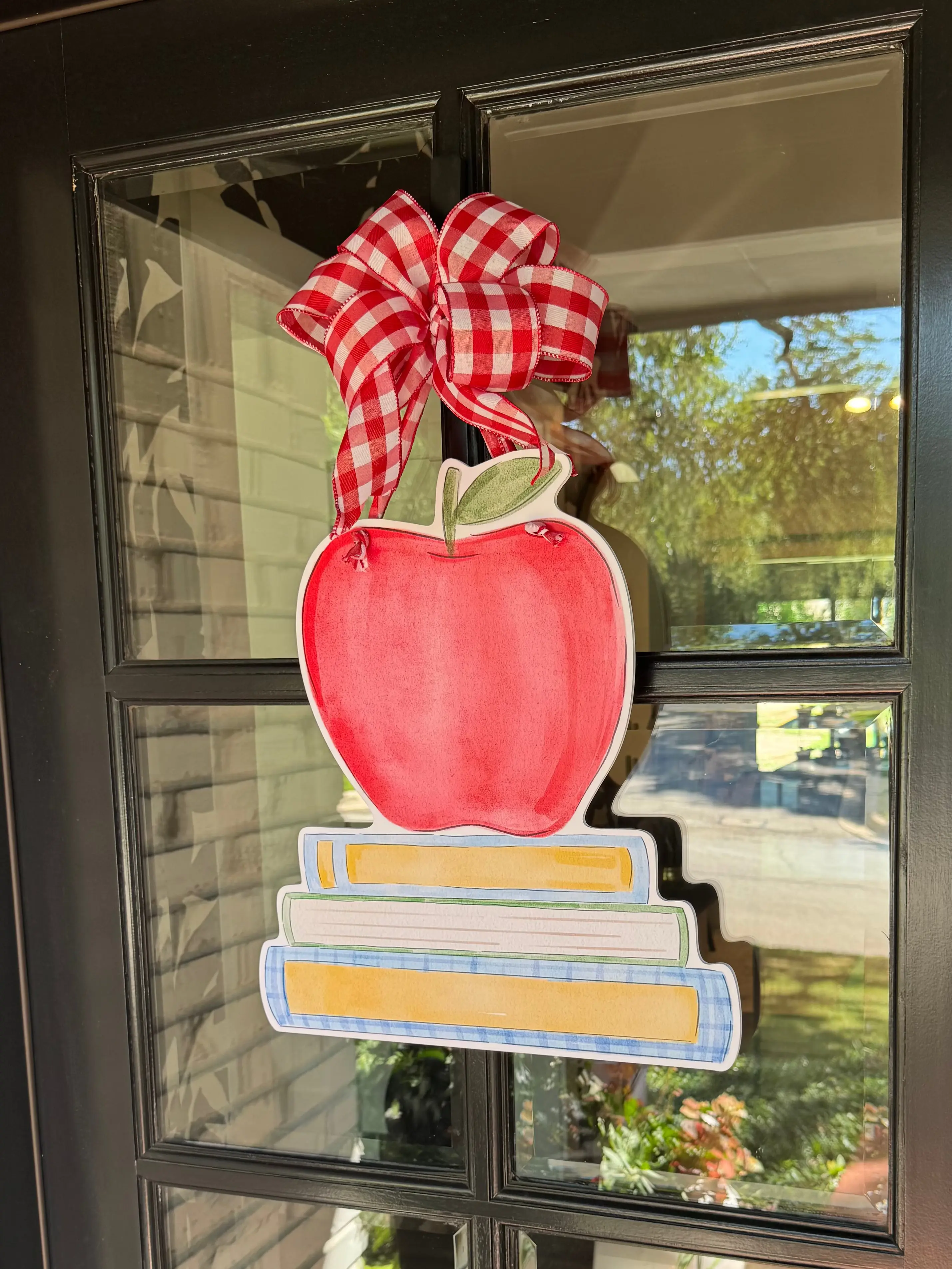 The Apple Book Stack Door Hanger