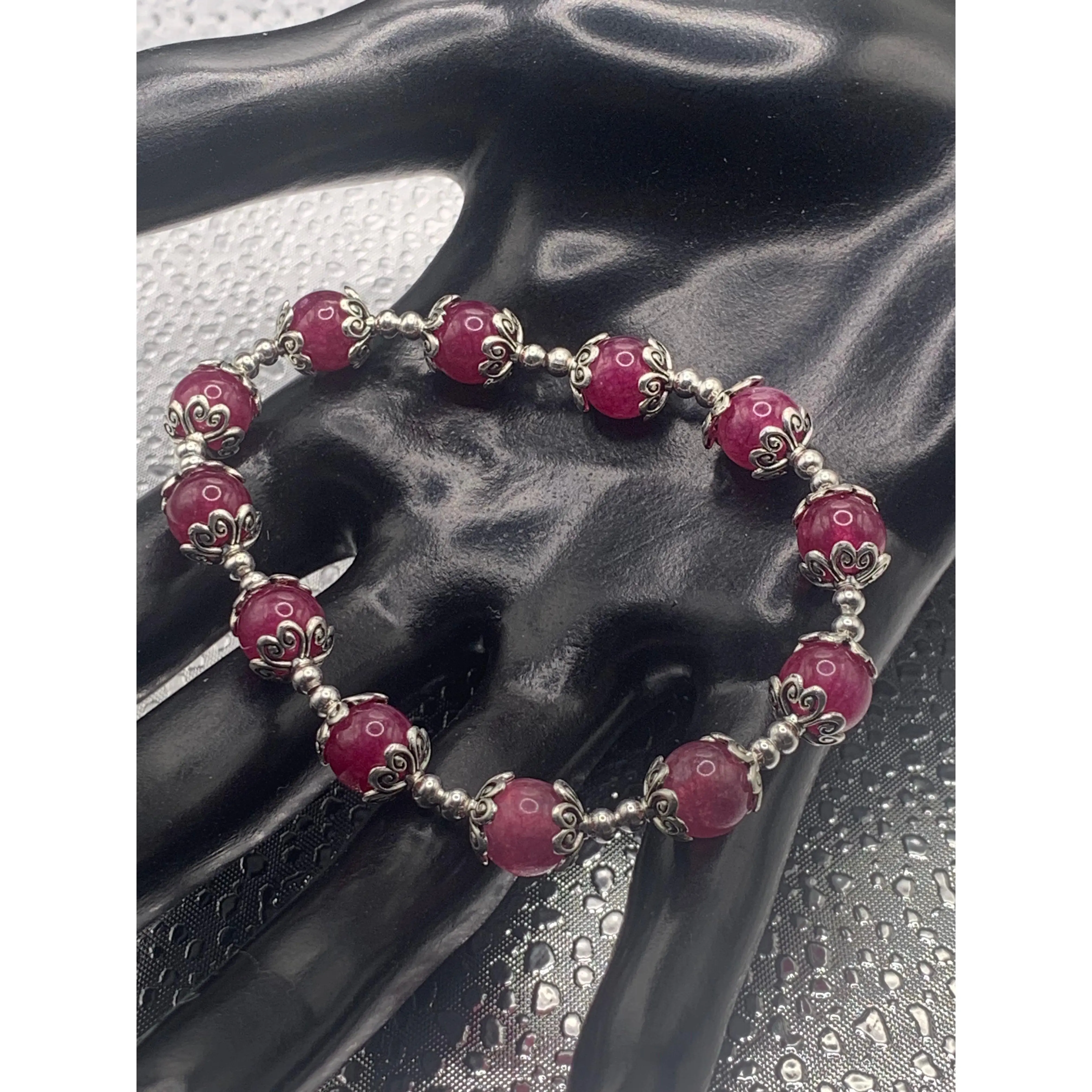 Dark pink chalcedony semi precious stone/crystal beaded elastic bracelet with silver plated spacers & bead caps