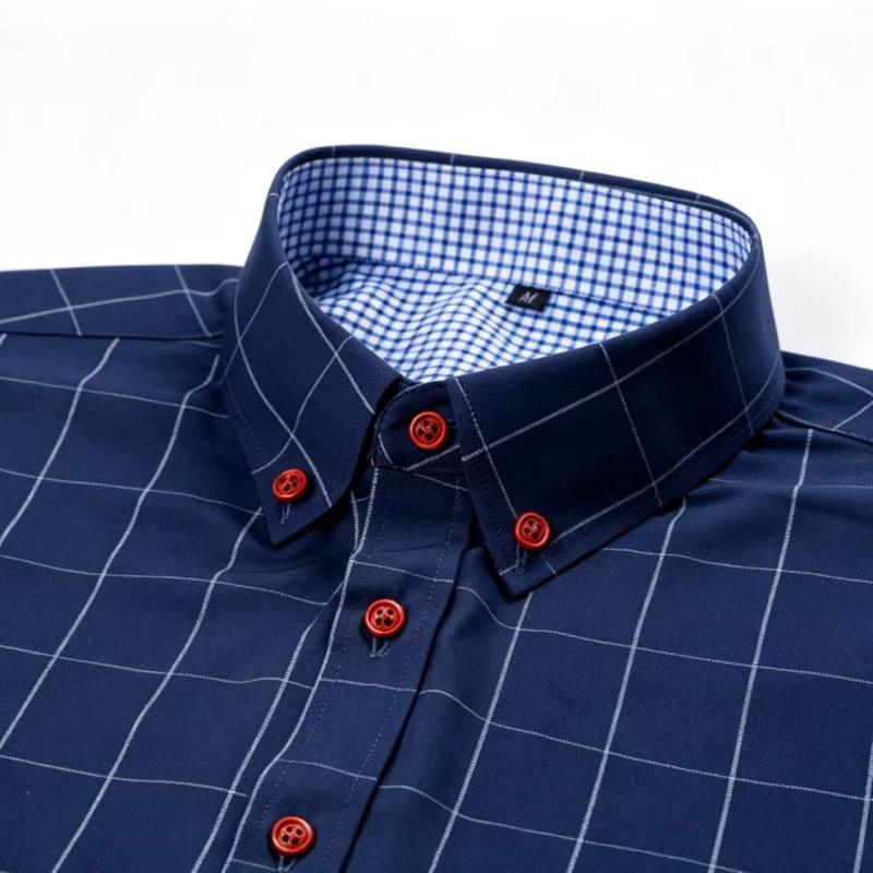 Men’s long-sleeve shirt with four plaid color-block panels, business-casual style. Button-down notched collar design for a sharp look, red buttons add refined details, blue-and-white plaid interior provides visual depth. Long-sleeve fit suitable for multi