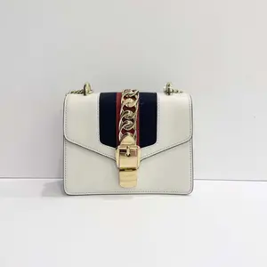 Pre-owned GUCCI Sylvie White Black & Red Cowhide Mini Ribbon Chain Bag with Gold Hardware and Iconic Web Detail