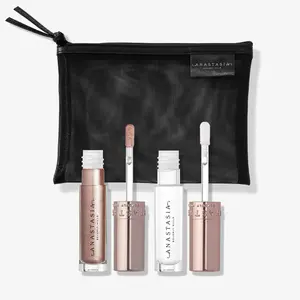 Gloss Icons Duo - Two Deluxe Mini Lip Glosses in Amber Sparkle and Crystal + Makeup Pouch