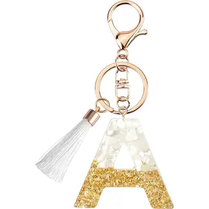 Cute key chains for women and girls, first-letter key chains with white tassels, charming key handbags and backpacks