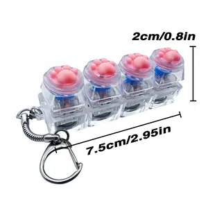 A stress-relieving cat paw toy mechanical keyboard with crystal key LED lights and a transparent design, featuring a keychain for multi-functional use.