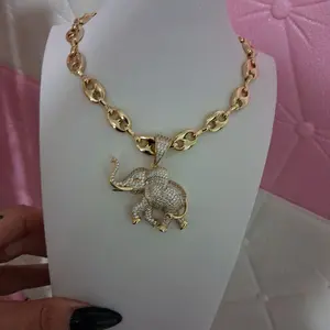 16 "Coffe Beam chain with Elephant pendant 14 k gold laminated.