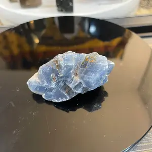 Celestite crystal handheld