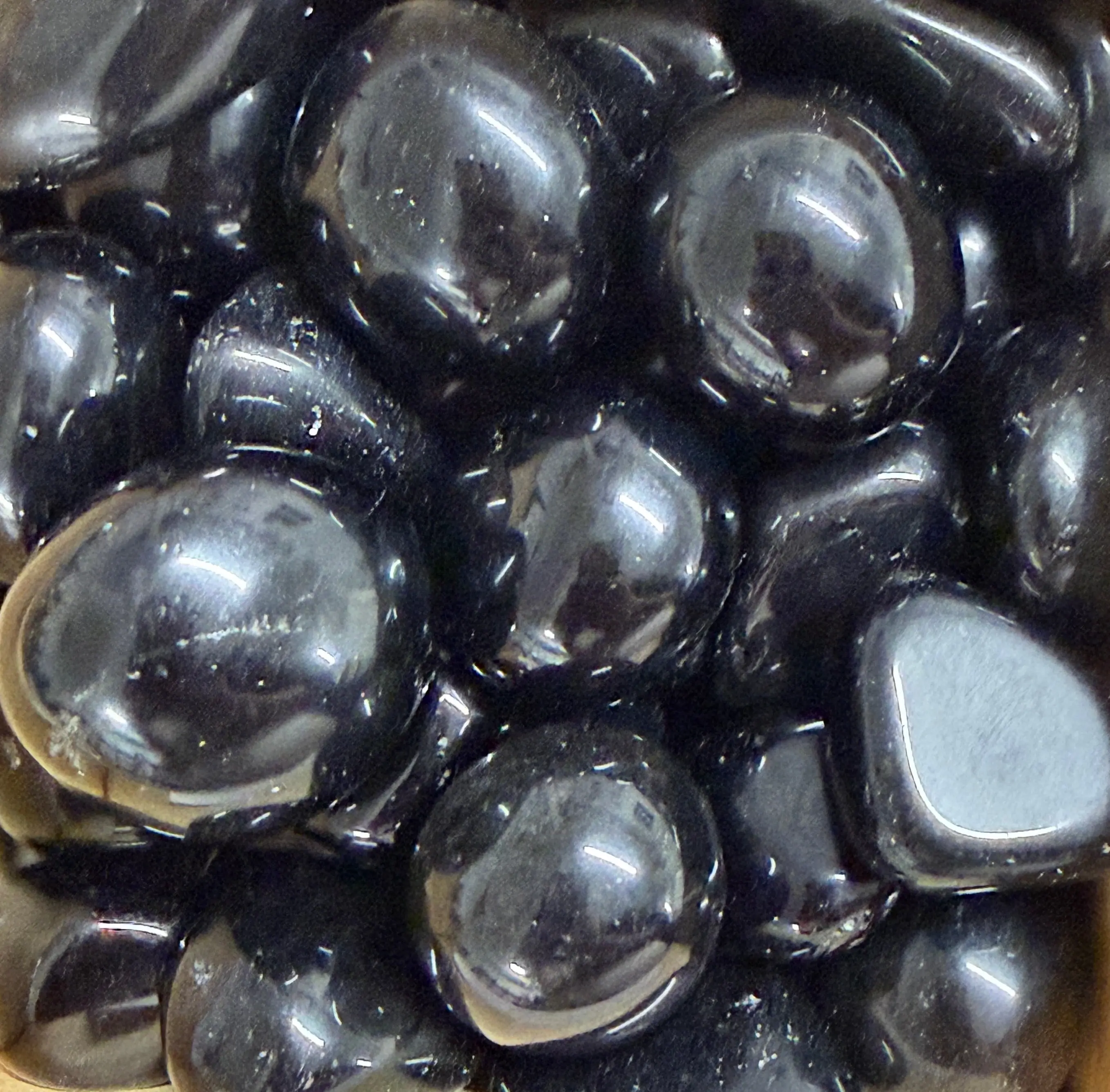 black obsidian tumbles black obsidian tumbles