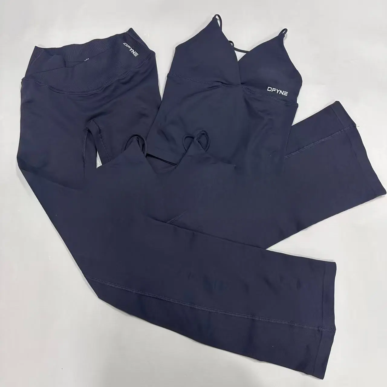 Blue-gray vest + bell-bottom pants