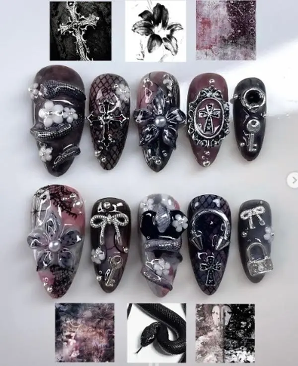Gothic Romance Nails – Dark floral elegance in black, silver, and wine hues with crosses, lace, pearls, and chains, embodying vintage mystery and gothic luxury.