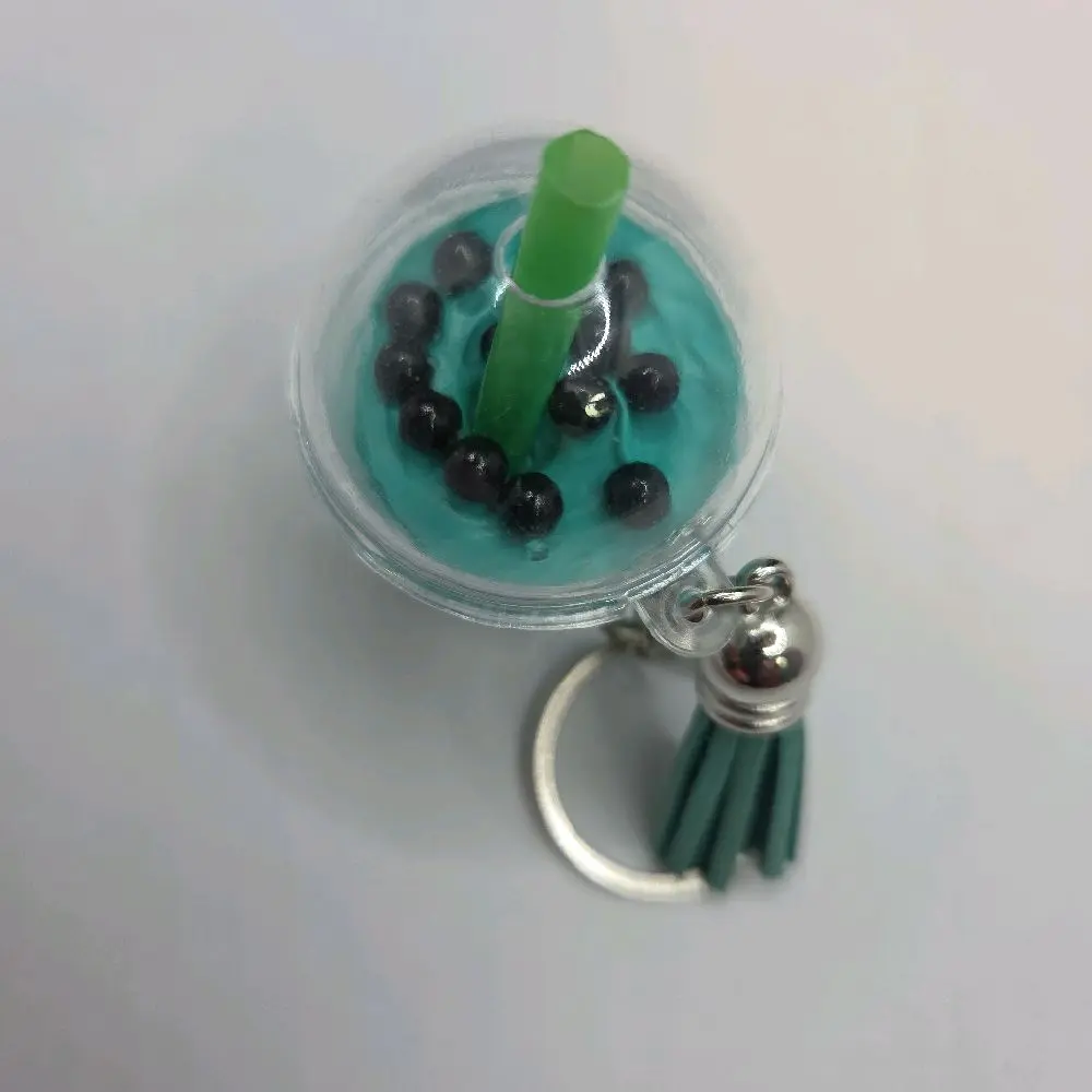 Medium-Sized Cute Teal Plastic Shake Keychain, Fruit Cherry Topper & Green Tassel Fashion Accessory for Keys, Bags, Oval, Solid, Teal Shake, Blueberry Fill, Everyday, Portable, Bags For Everyday