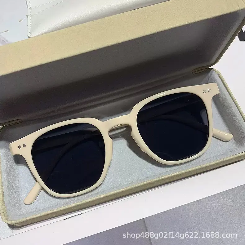 Off white frame gray film