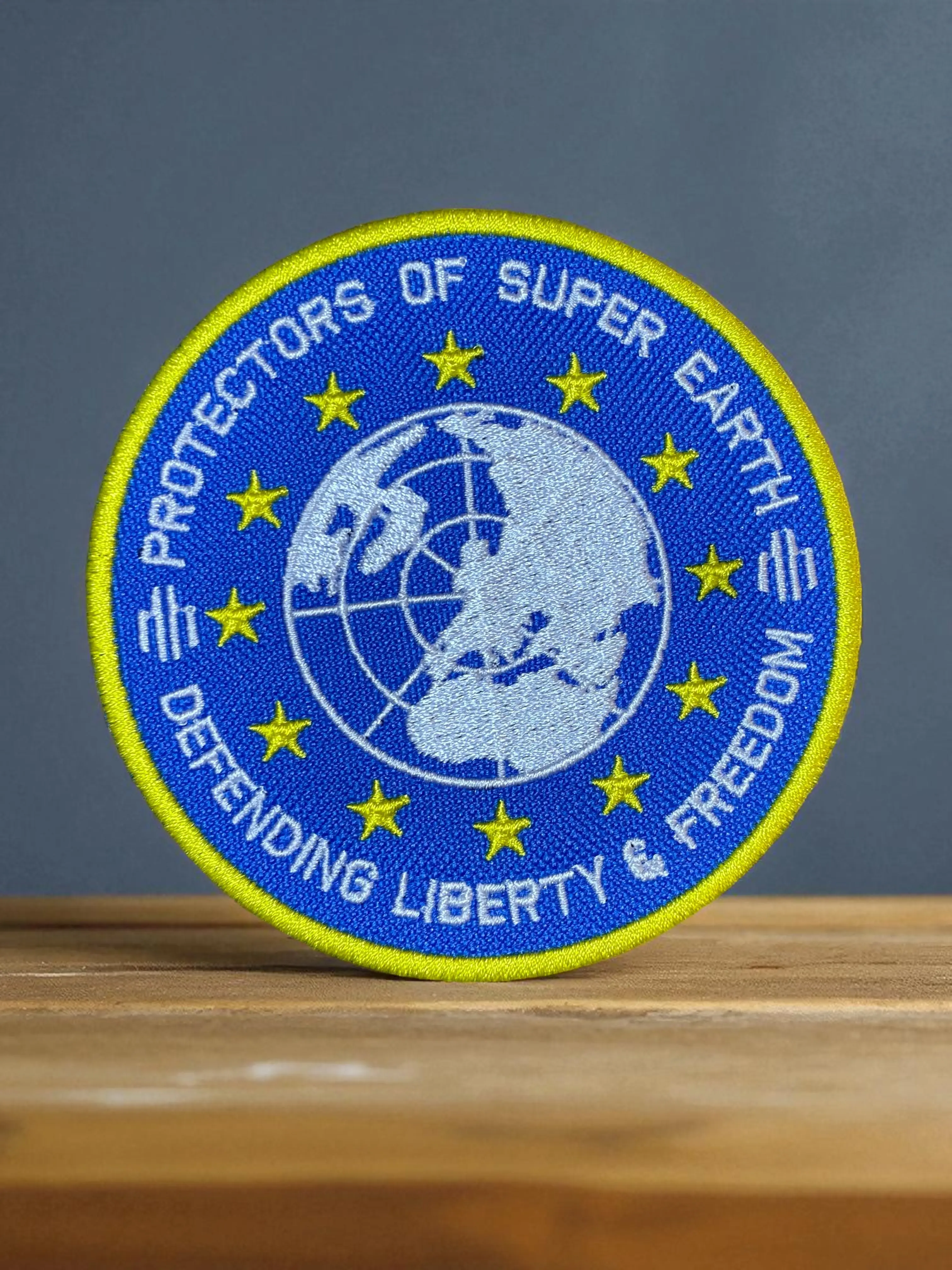 Helldivers Protectors of Super Earth Global Emblem Embroidered Patch - 4 in Iron-On, Sew-Velcro Application Fabric Applique, Sewing Accessory for Jackets/Bags, Uniforms/Cosplay