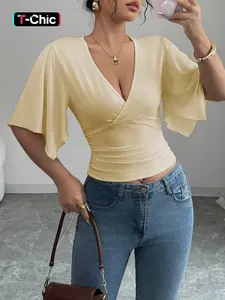 Women's Asymmetric Hem Fitted Cropped Crop Top with Ruffled Design, Asymmetrical Casual Short Sleeve Hollow Out Knit Blouse for Vacation Style, Trendy Summer Wear Shirts, Lady
