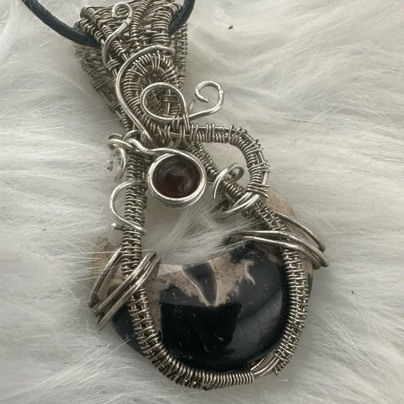 Handmade Sterling Silver Wire Wrapped Palm Root Fossil Moon Pendant with Garnet | Ancient Earthstone Jewelry