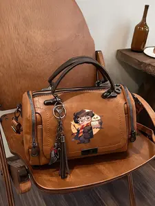 A Boston-style tote bag with a bespectacled boy and owl motif. Large capacity, can be worn crossbody or as a handbag. Casual and versatile, perfect for everyday commuting, travel, and shopping. A perfect gift.