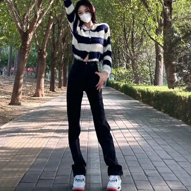 Black straight trousers.