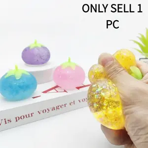 Mini Tomato Squeeze Toy  Slow-Rising Stress Reliever. This portable stress-relief toy helps alleviate anxiety and soothe tension, making it an excellent gift. Featuring a cute, transparent design, it is perfect for use in the office.