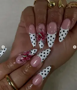 Cute Polka Dot French Tip Nails with 3D Pink Flowers – Fun & Playful Stiletto Nail Art Design Perfect for TikTok Trends 2025