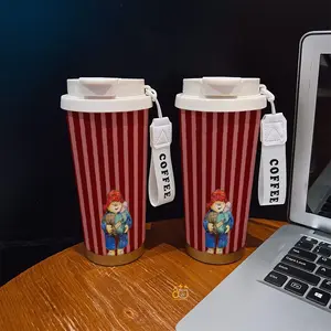 Coffee mug ~ 530 ml / 17.92 oz insulated mug，Paddington Bear with Gifts Red Striped Background Pattern PrintDouble-walled, leak-proof, travel mug with handle; perfect for coffee lovers, art enthusiasts, sports enthusiasts, and those seeking a gift.