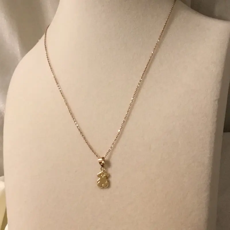 10k gold 17.5 chain with a bear pendant