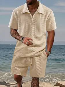 Men’s casual two-piece set featuring a turn-down collar short top with half-zip and drawstring, paired with shorts; jacquard design with 3D texture, suitable for everyday summer wear and commuting.