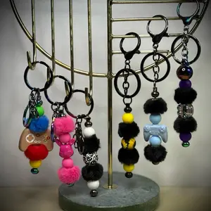 Fun and Quirky Keychains with Silver Hardware - Custom Handmade Designs for Colorful Bag Charms and Unique Accessories