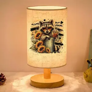This ambient table lamp features a raccoon wearing heart-shaped sunglasses. Powered by USB, it's suitable for bedroom and living room décor and makes a perfect gift for family and friends on Valentine's Day, Christmas