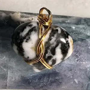 Howlite Crystal Pendant with Gold Wire Wrap Design Natural Stone Jewelry Accessory