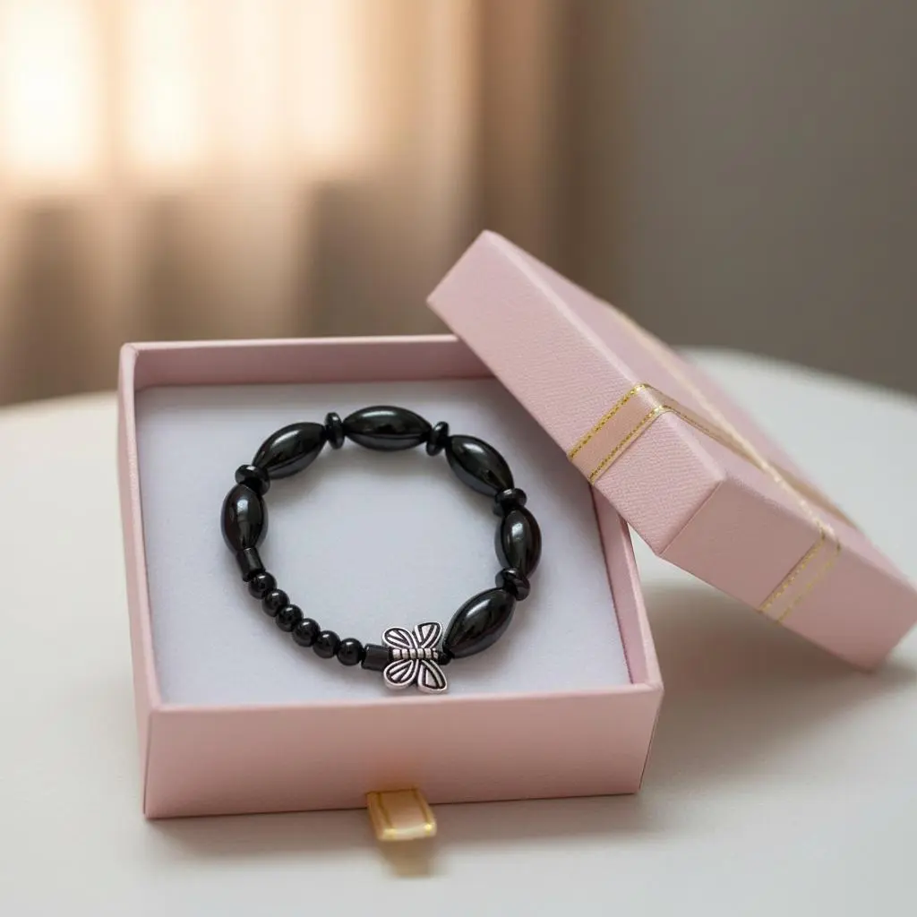 lisa's unique bead-art Child's Grounding Hematite Stone Bracelet, Handmade Stretch Design with Steel Butterfly Charm & Oval Accents, Grounding Aid, Choking Hazard Small Parts, Hematite Stones, Elegant, Daily Wear, Stretchy Cord, 10X12mm, Energy Balancing,