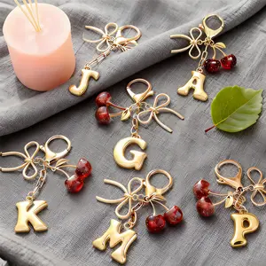 Women's Cherry Bow Keychain Letter Pendant Wallet Backpack Accessory Student Handbag Car Key Chain Alphabet Initial Letter Keychain Cute Alloy High-Quality Keychain for Backpack Charms Initial Keychains for Women Including Perfect for Spring Wear
