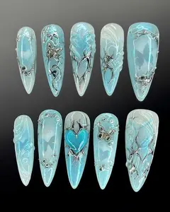 Glacier Heart Nails: Icy Blue Chrome Set with 3D Silver Armor, Melting Edges & Abstract Hearts for an Ethereal Cyber-Fantasy Look