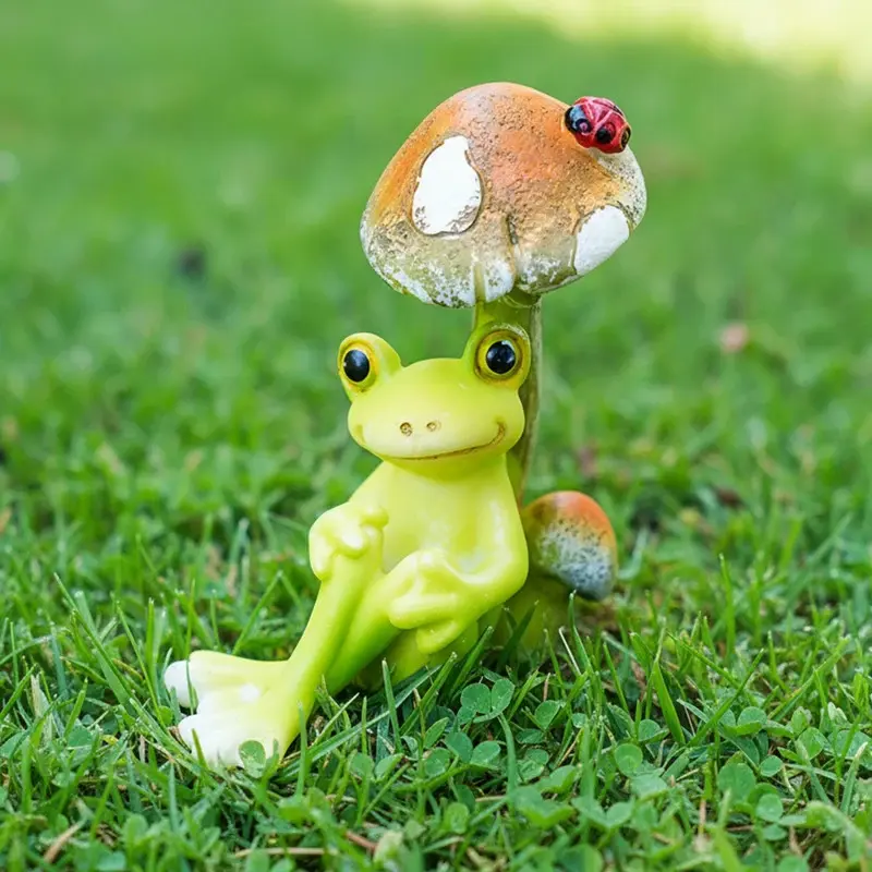 A cute cartoon frog, decorated with mushrooms on its back, suitable for garden decoration and DIY miniature landscapes