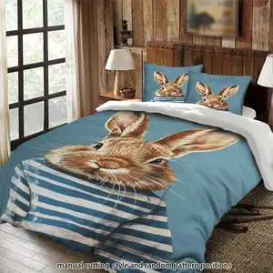 This 3-piece bedding set features a blue background with an illustration of a rabbit wearing a striped shirt. It's a suitable gift.