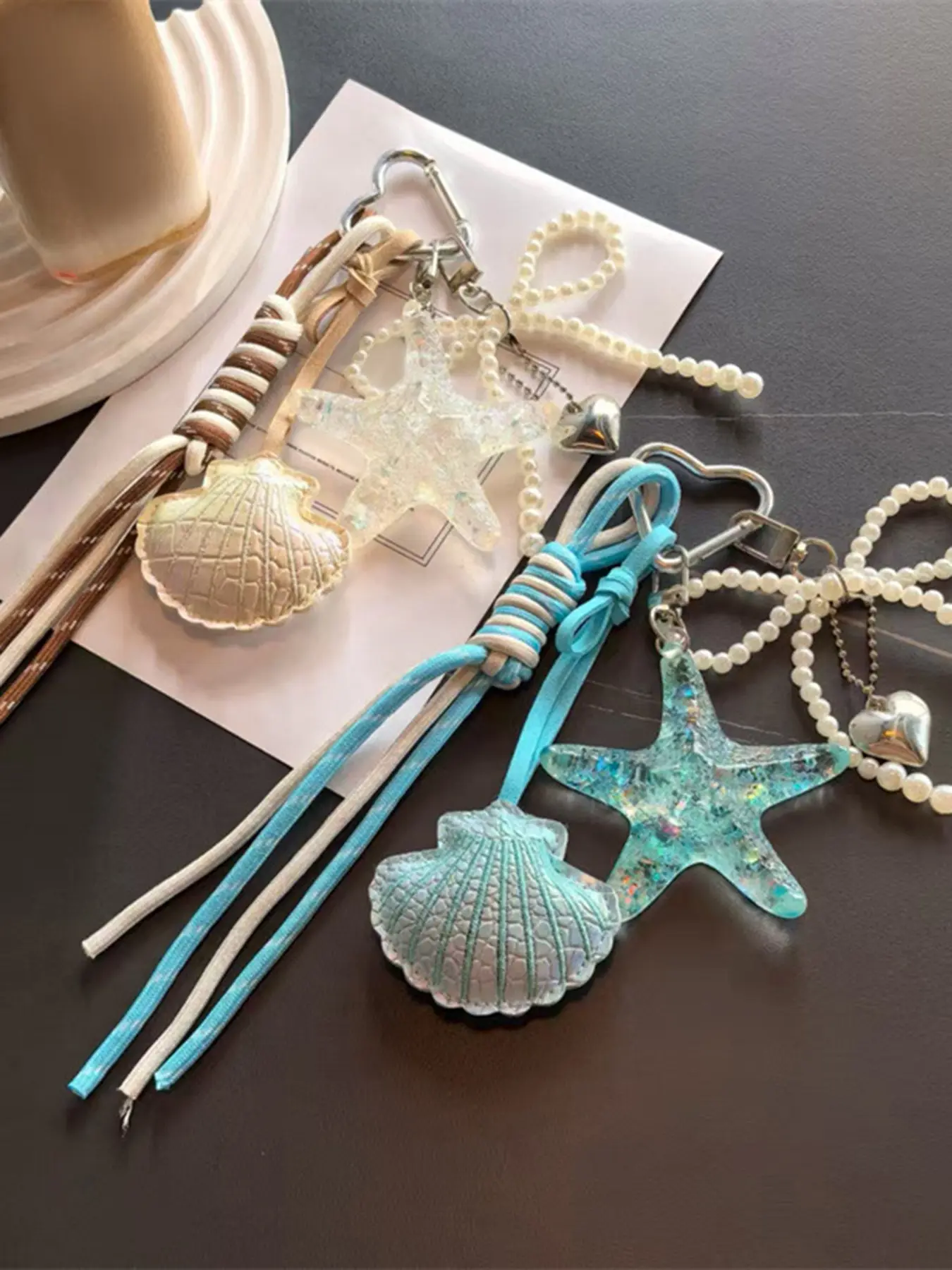 Fresh artistic ocean style starfish shell pendant with bow and heart-shaped decoration design, paired with contrasting woven lanyard, lightweight and easy to carry, can be used as a bag hanger and keychain, Keychain For Bags