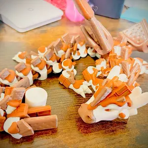 3D Printed Articulated S'mores Dragon - Unique Design with Brown and White Elements