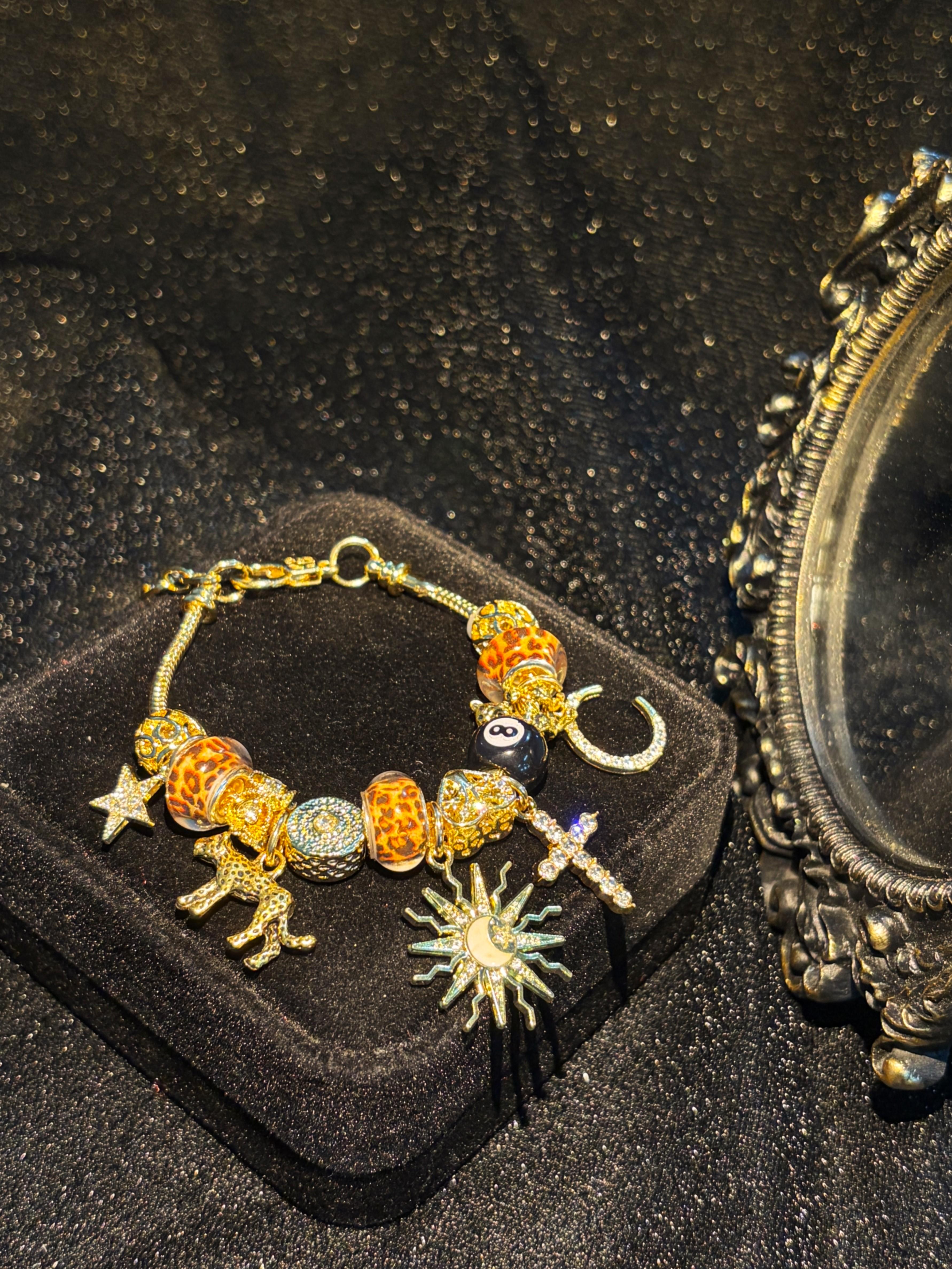 Women's Gold-Tone Leopard Print Charm Bracelet - Stackable Vintage Y2K Boho Beaded Bracelet with Sun, Moon, Star, Cross, Panther, 8-Ball Charms - Costume Jewelry Gift Women's Gold-Tone Leopard Print Charm Bracelet - Stackable Vintage Y2K Boho Beaded Bracelet with Sun, Moon, Star, Cross, Panther, 8-Ball Charms - Costume Jewelry Gift