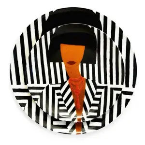 Entree and salad plates featuring a woman in a striped suit, crafted from high-quality ceramic.