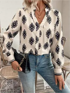 A women's fashionable new all-over print V-neck cutout lantern sleeve shirt top, suitable for spring and summer, appropriate for daily casual wear, commuting, vacation, and other occasions.