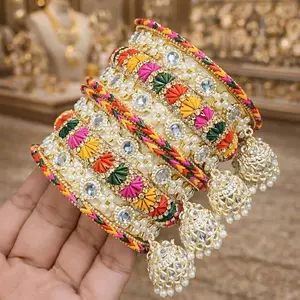 Multicolor Brass Love Set with Moti Jhumar - Vibrant Floral Designs & Rhinestone Accents for Festive Wear