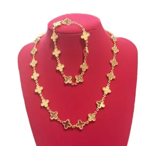 Four Leaf Clover Set - Elegant Necklace  Leaf Accents and Gold-Tone Finish plated Gold