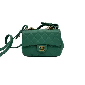Pre-owned CHANEL HZ7 Mini Trapezio Flap, green with gold tone hardware. 70934