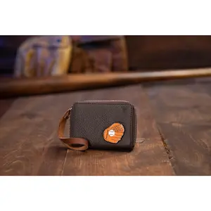 Wristlet with Strap and Metal Glove Inlay