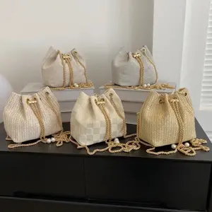 Women's Canvas Straw Solid Color Streetwear Bucket String Bag with Pearl Accents and Gold Chain Strap
