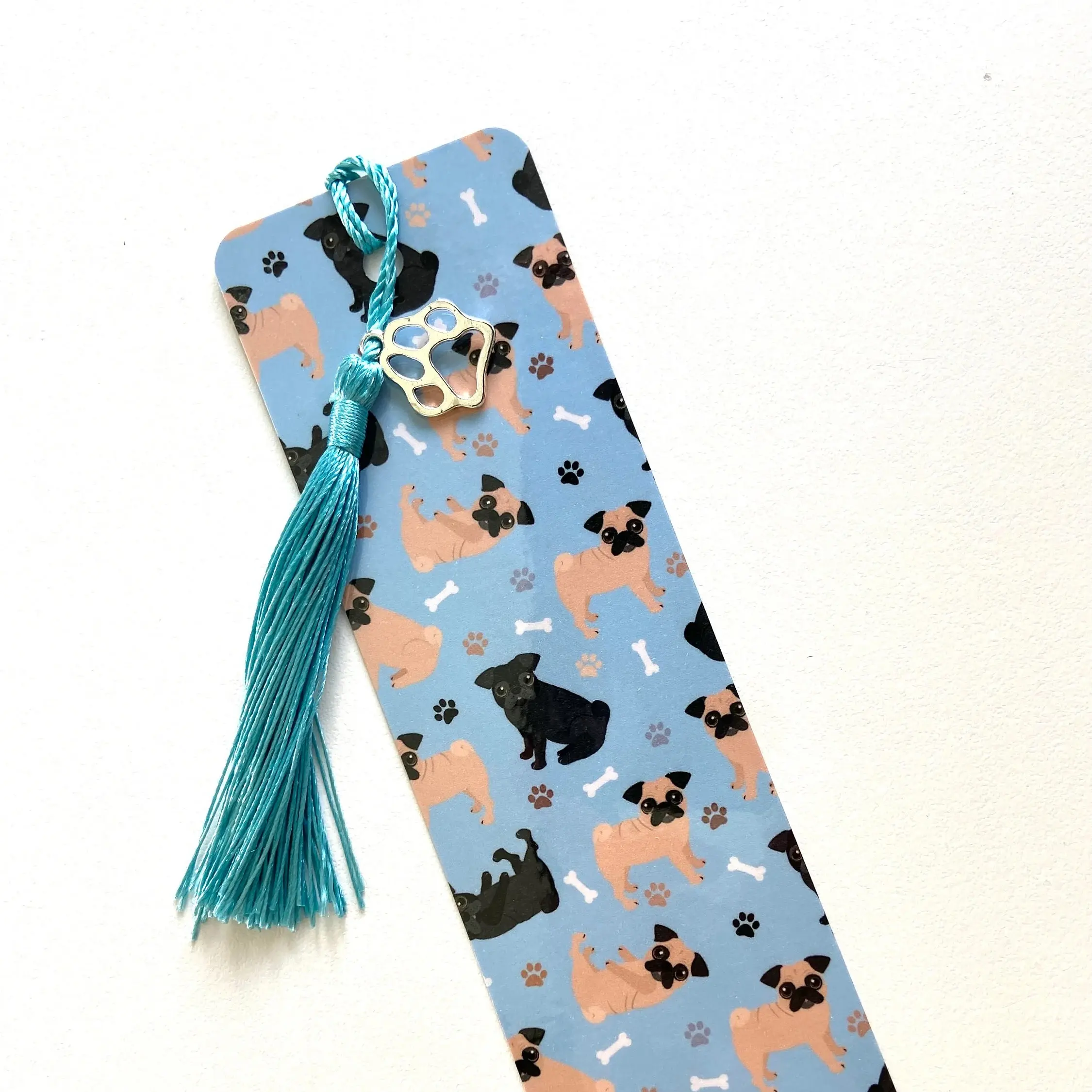 PETS BY JANNA Cute Pug Bookmark Black and Tan Pugs Pattern with Dog Paw Charm and Tassel for Book Lovers 2" x 7" Cardstock Paper Laminated Accessory