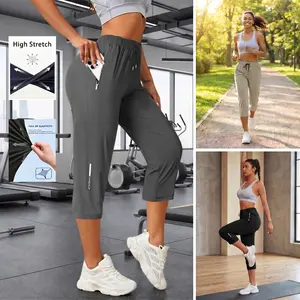 Women’s high-stretch loose three-quarter athletic pants with zippered pockets, quick-drying breathable ice silk fabric—ideal for running, fitness, yoga, outdoor activities, commuting, and casual wear; versatile pants.