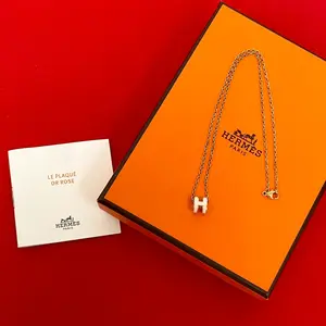 Pre-owned HERMÈS Brass Small Leather Goods Mini Pop H Necklace